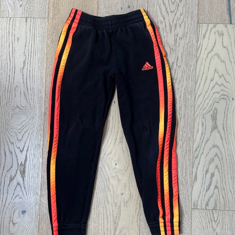 Adidas Kids Black Sweatpants with Red and Orange Accents